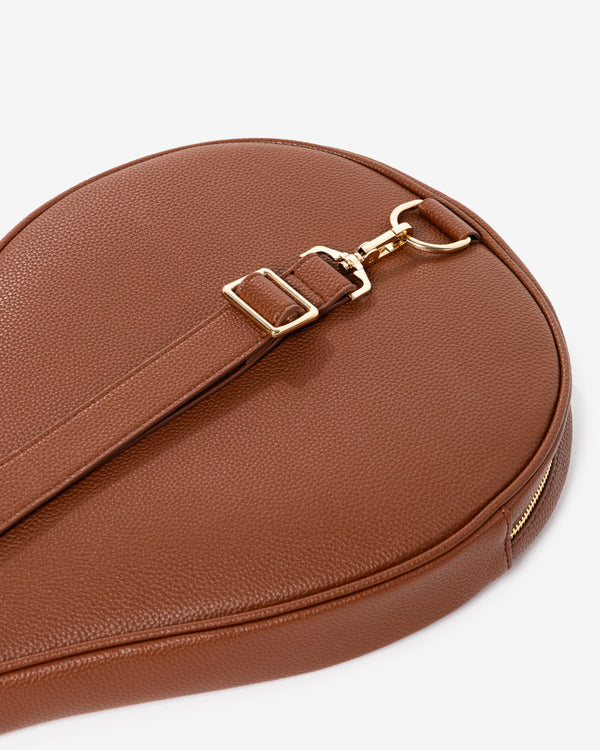 Gold clasp and adjustable shoulder strap detail on Ten Twenty Arabica Coffee padel racket bag in tan brown vegan leather