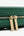 Gold precision zip detail on Ten Twenty Emirates Palms padel racket bag in forest green vegan leather