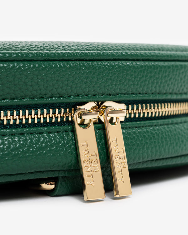Gold precision zip detail on Ten Twenty Emirates Palms padel racket bag in forest green vegan leather