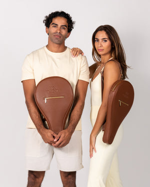 Man and woman holding Ten Twenty Arabica Coffee padel racket bags in tan brown vegan leather - Ten Twenty UAE