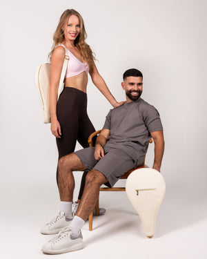 Man and woman with Ten Twenty Jumeirah Pearls padel racket bag in cream vegan leather - lifestyle shot UAE